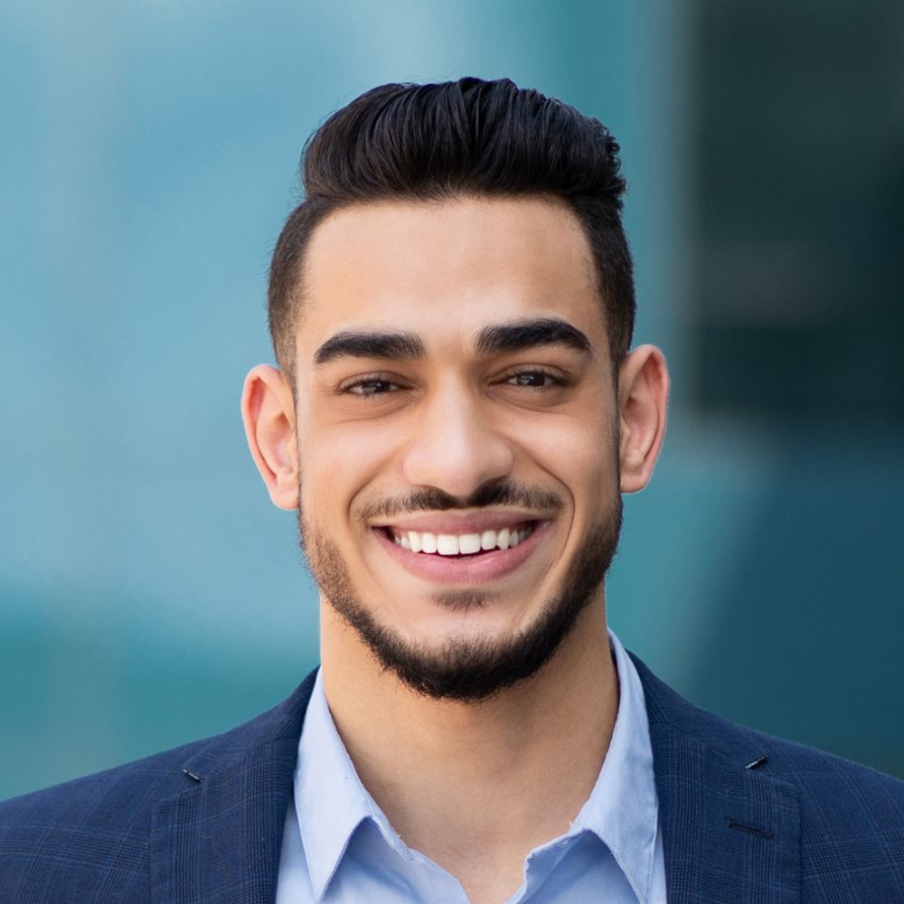 handsome middle eastern guy businessman posing nex DHP2CZH 2